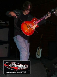 Chris Manning playing guitar in The Hindenburg Project - Led Zeppelin Tribute Band